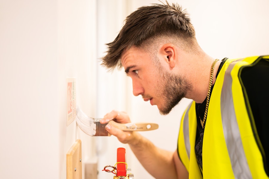 A Volunteer It Yourself volunteer working on the Freeport East office